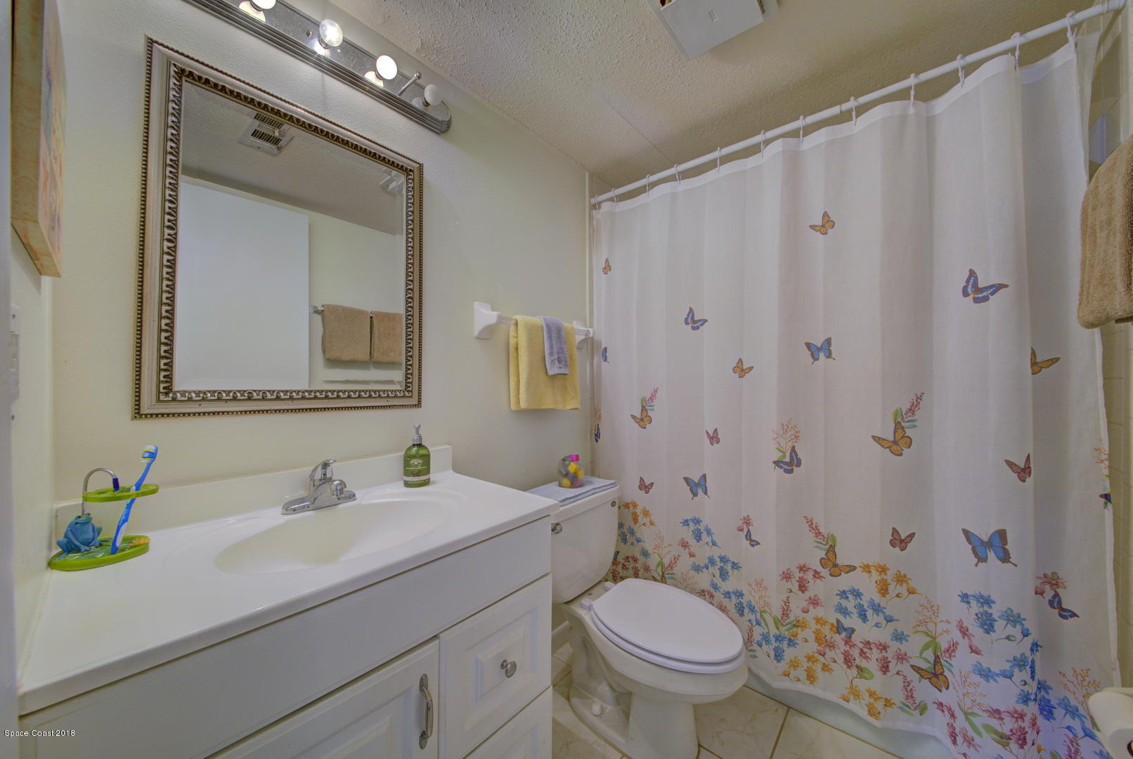 500 Catalina Road, Unit 405 Cocoa Beach, FL 32931 - Photo 7 of 22 Guest Bathroom w Tub-Shower