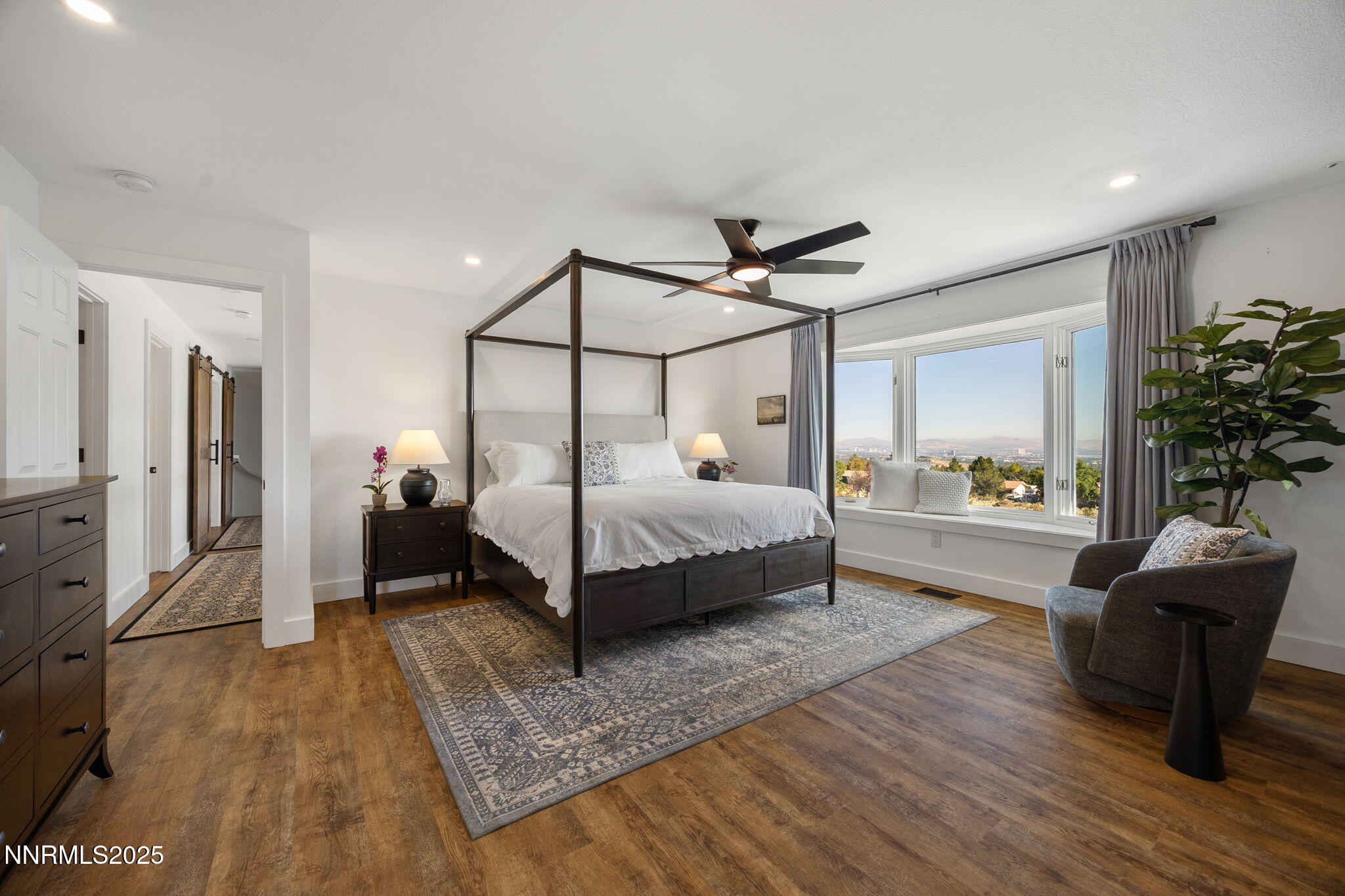 13205 Welcome Way Reno, NV 89511 - Photo 17 of 79 a bedroom with a bed and a mirror