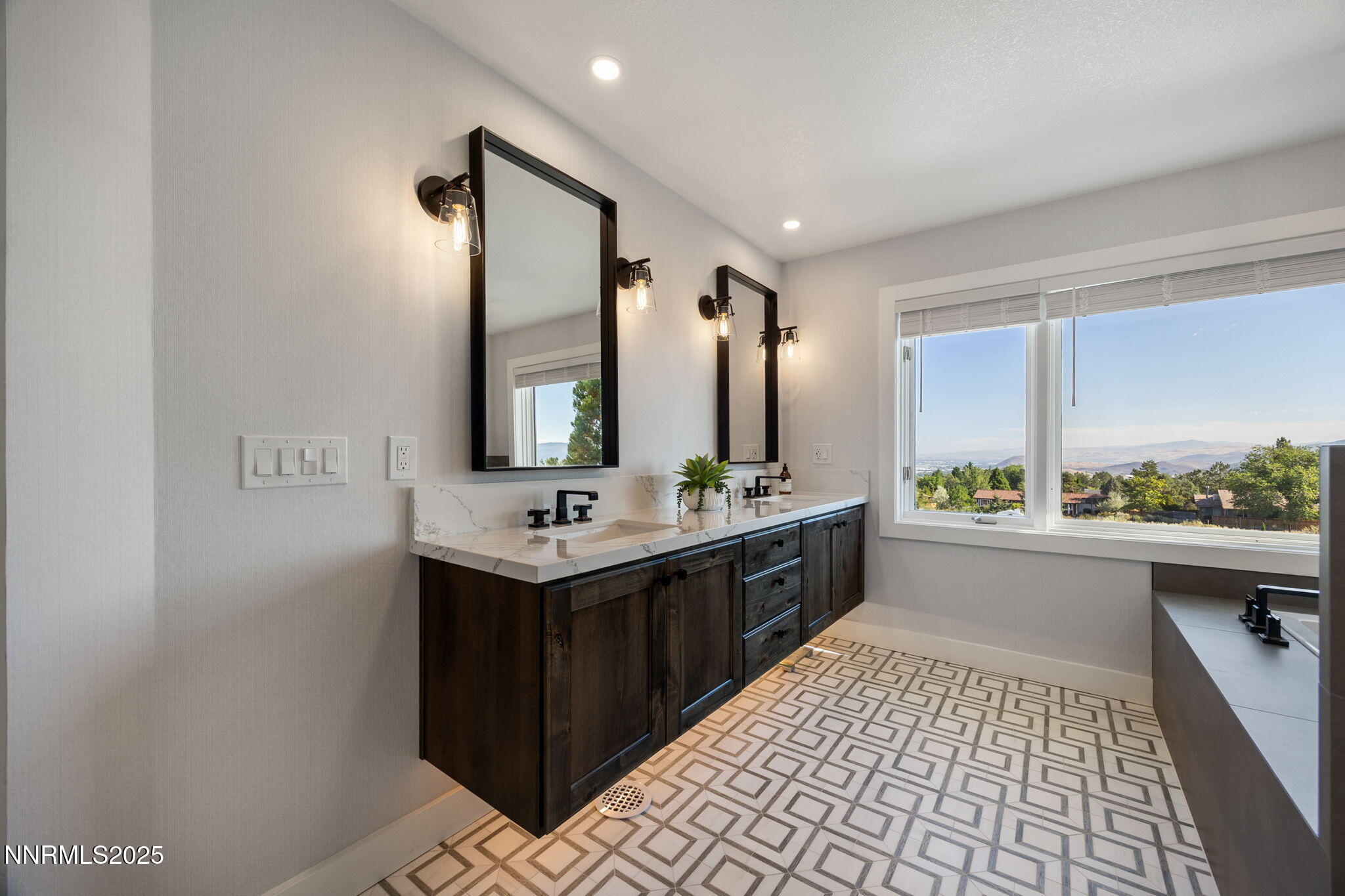 13205 Welcome Way Reno, NV 89511 - Photo 21 of 79 a large bathroom with a double vanity sink and mirror