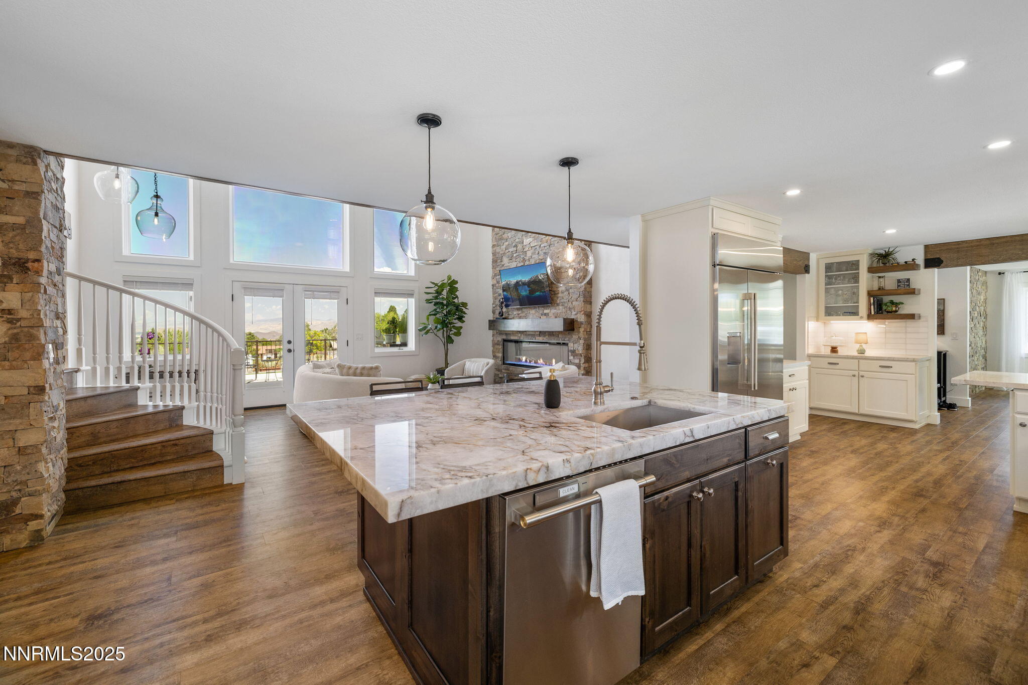 13205 Welcome Way Reno, NV 89511 - Photo 3 of 79 a kitchen with stainless steel appliances granite countertop a kitchen island a stove and a sink