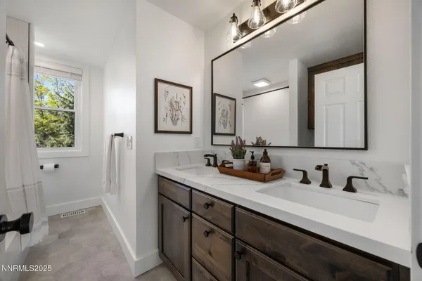 a kitchen with a sink and refrigerator