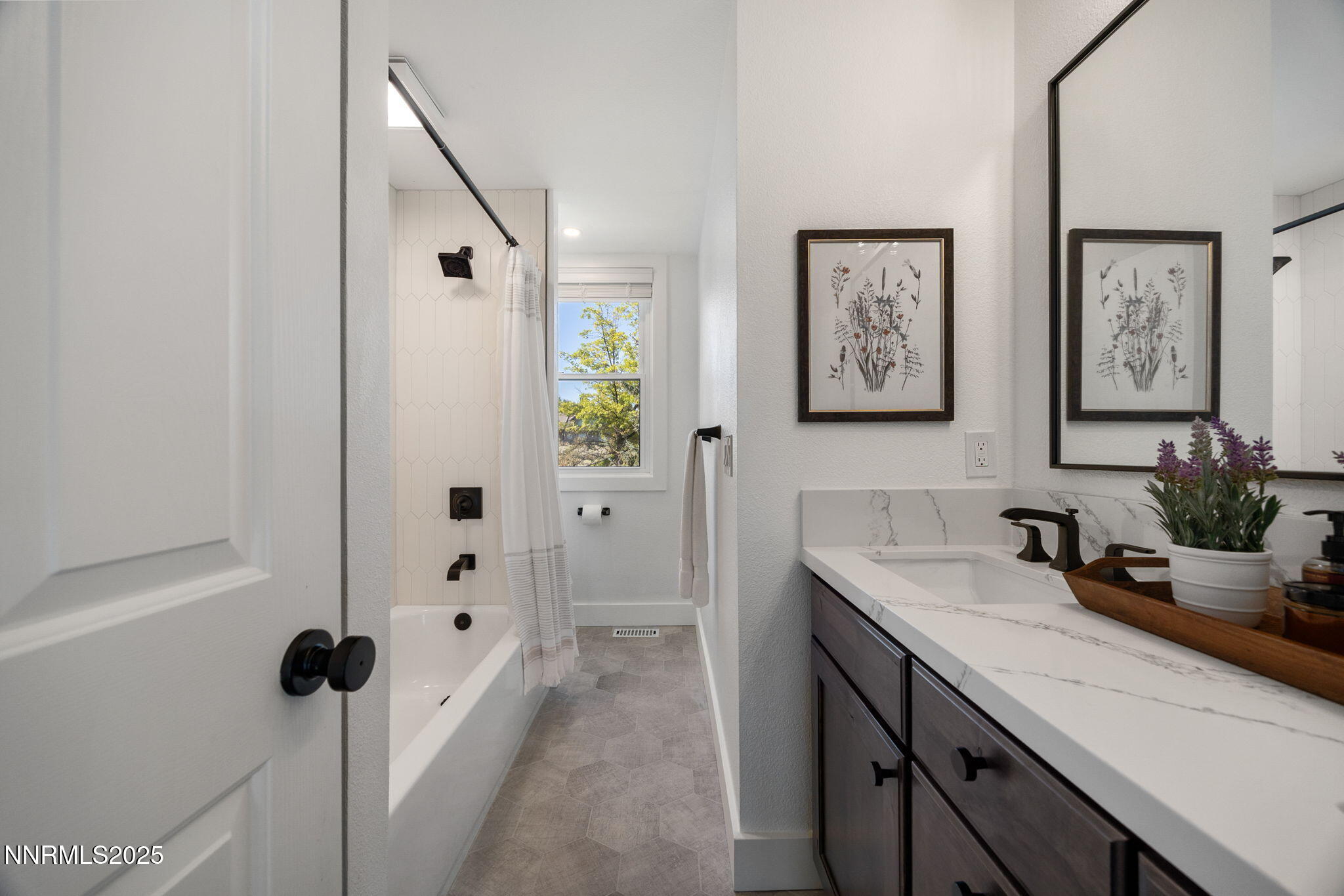 13205 Welcome Way Reno, NV 89511 - Photo 32 of 79 a bathroom with a sink and mirror with shower