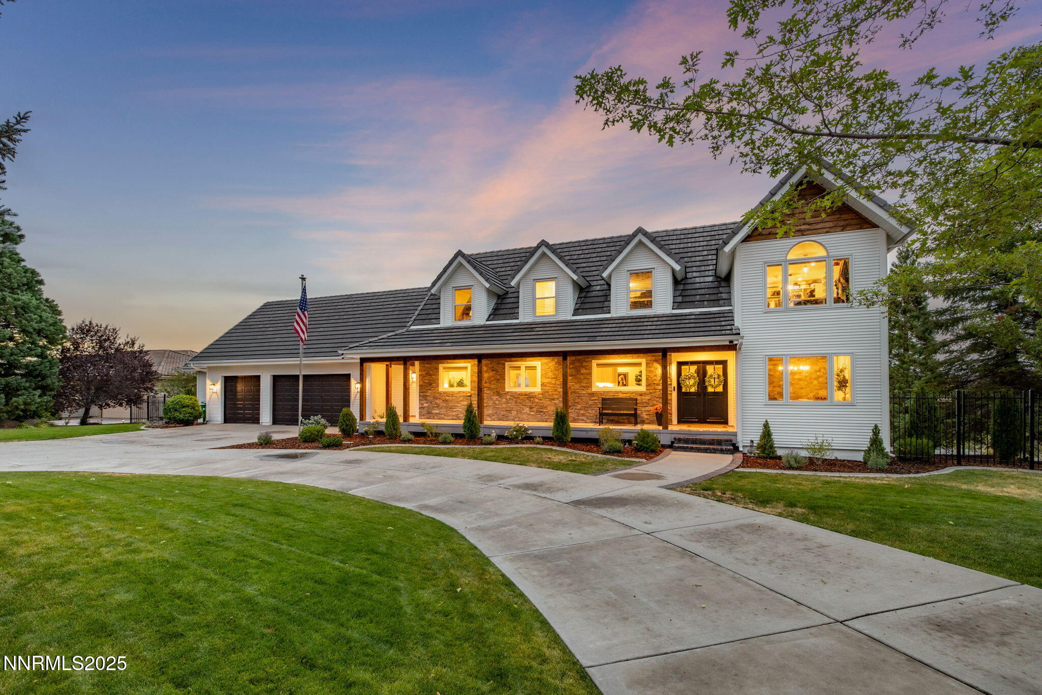 13205 Welcome Way Reno, NV 89511 - Photo 4 of 79 a front view of a house with a yard and outdoor seating