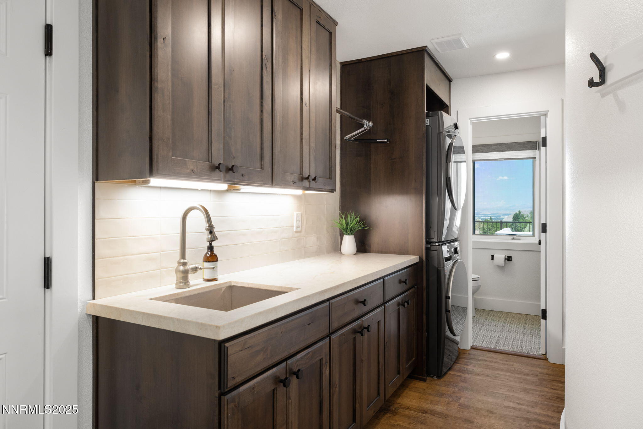 13205 Welcome Way Reno, NV 89511 - Photo 42 of 79 a kitchen with a sink and refrigerator