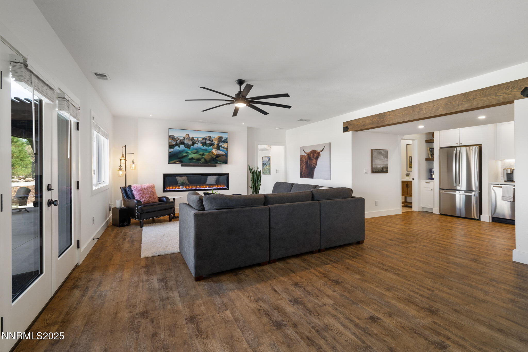 13205 Welcome Way Reno, NV 89511 - Photo 49 of 79 a living room with furniture and a large window