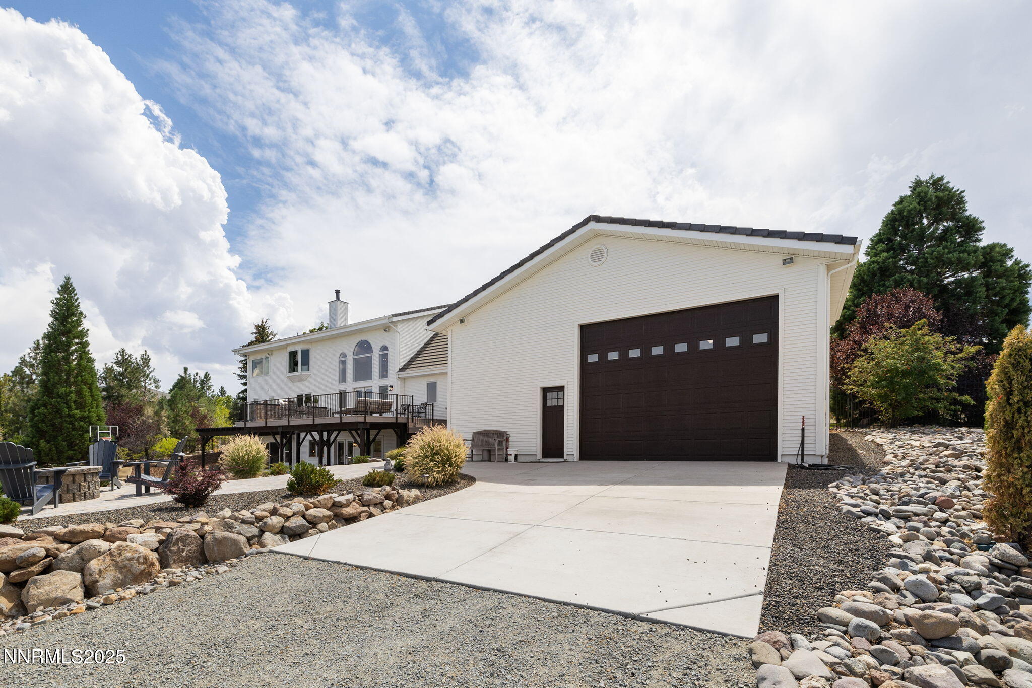 13205 Welcome Way Reno, NV 89511 - Photo 64 of 79 a front view of a house with a yard