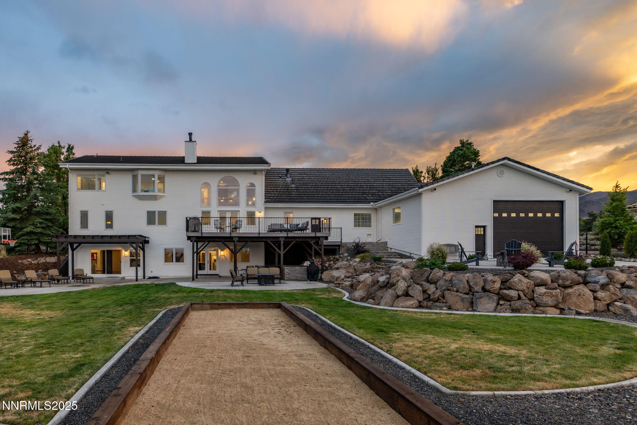 13205 Welcome Way Reno, NV 89511 - Photo 77 of 79 a view of a house with a backyard and a garden
