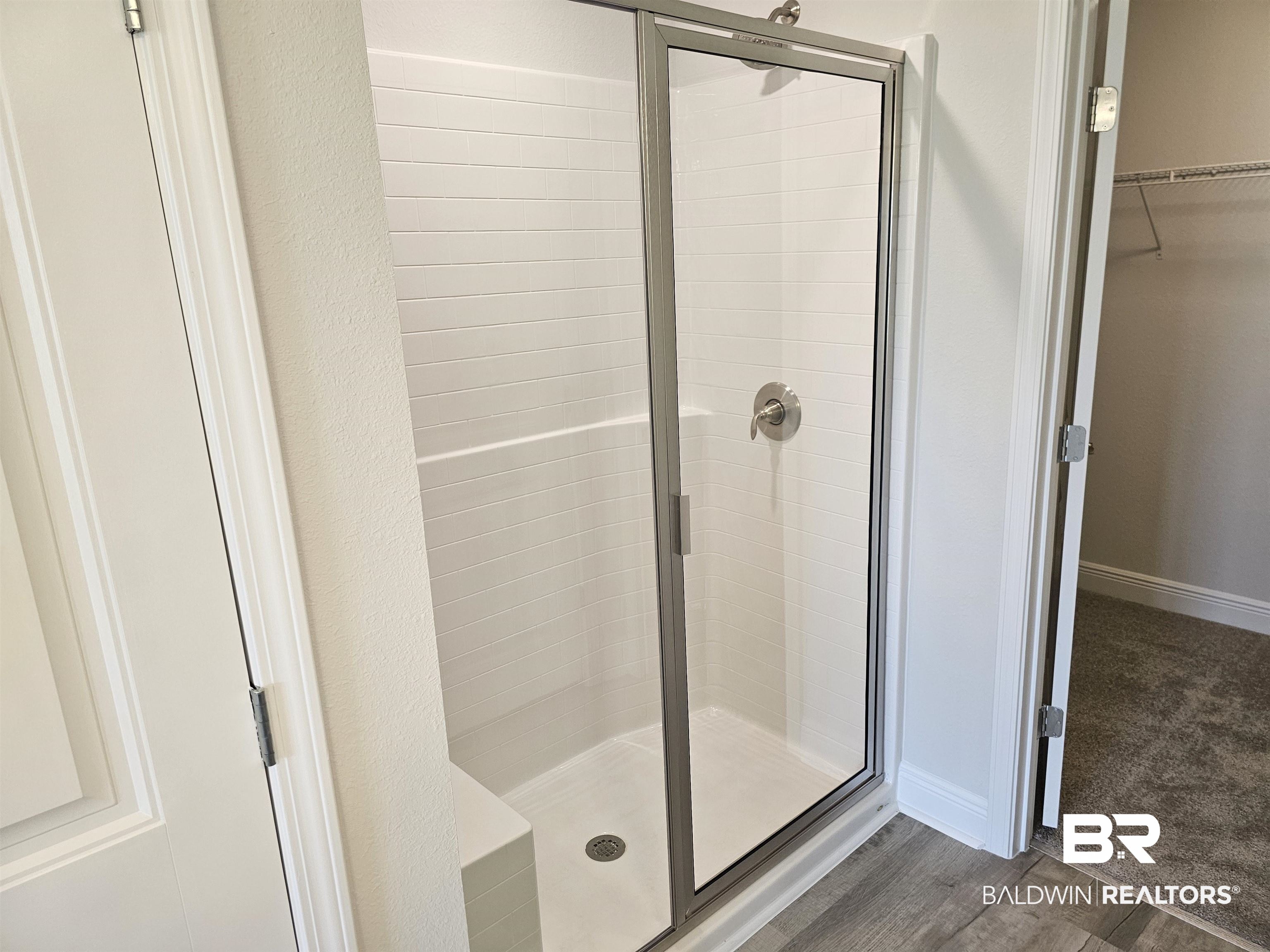 1412 Plymouth Drive Foley, AL 36535 - Photo 5 of 10 Bathroom with an enclosed shower and hardwood / wood-style floors