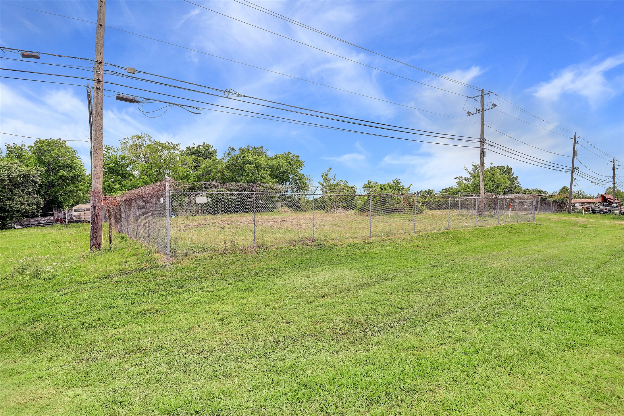 16534 Market Street Channelview, TX 77530 - Photo 5 of 7 a view of a garden with a lake