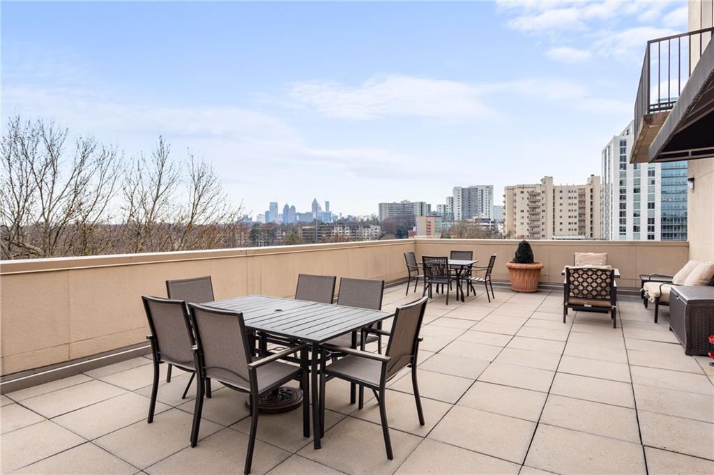 2255 Peachtree Road Northeast, Unit 326 Atlanta, GA 30309 - Photo 28 of 37 a view of a terrace with furniture
