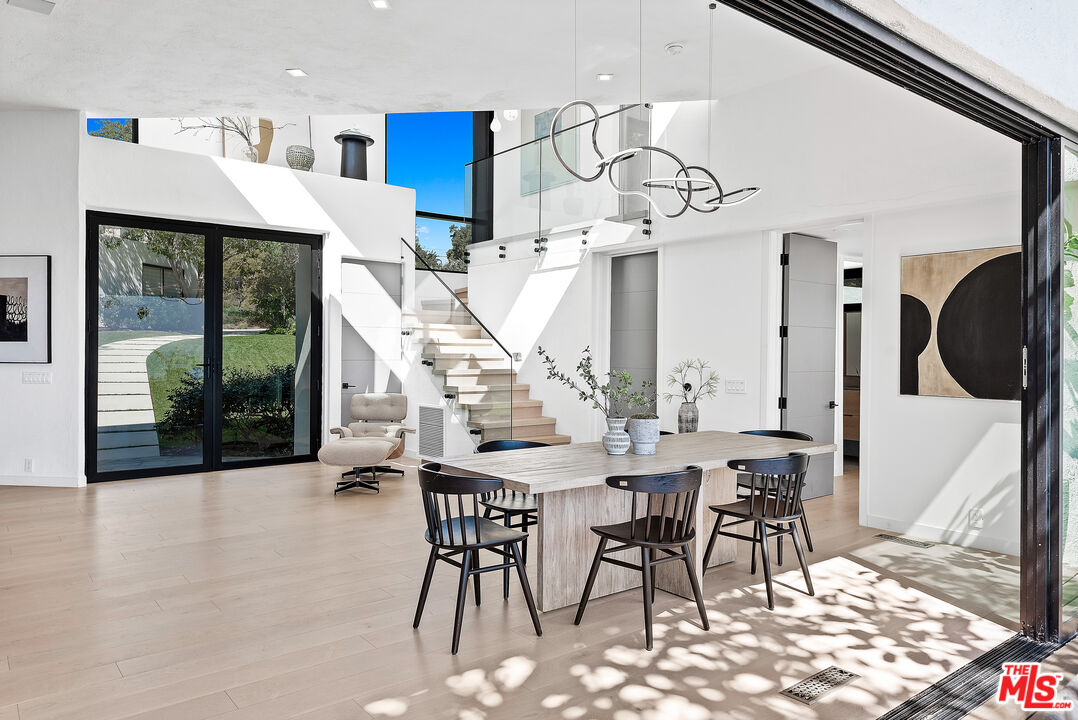 29122 Cliffside Drive Malibu, CA 90265 - Photo 15 of 39 a view of a dining room with furniture