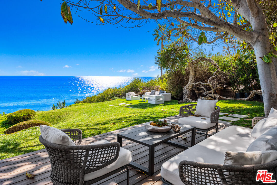 29122 Cliffside Drive Malibu, CA 90265 - Photo 16 of 39 a view of a chairs and table in the patio