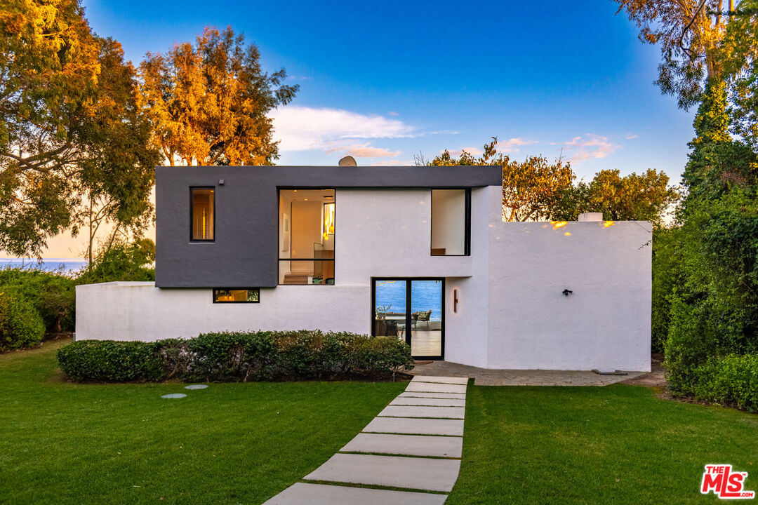 29122 Cliffside Drive Malibu, CA 90265 - Photo 23 of 39 a front view of a house with a yard