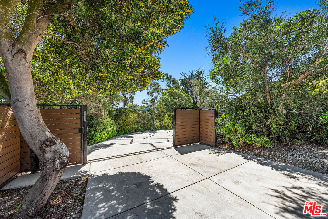 29122 Cliffside Drive Malibu, CA 90265 - Photo 6 of 39 a view of a bench in a backyard