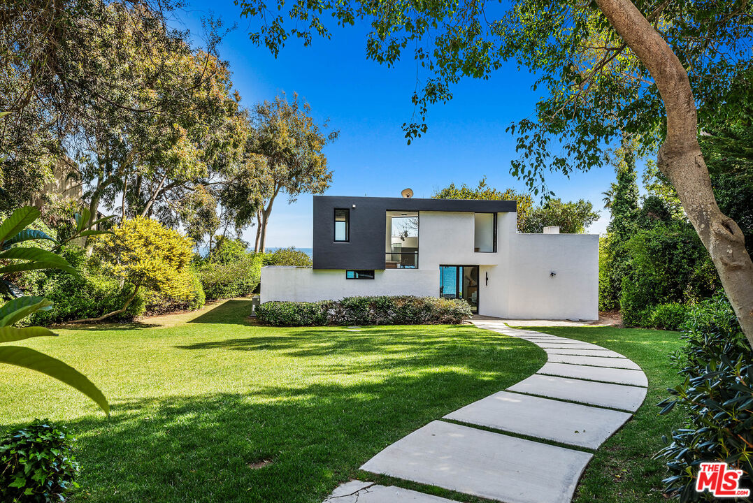 29122 Cliffside Drive Malibu, CA 90265 - Photo 8 of 39 a view of a house with a yard