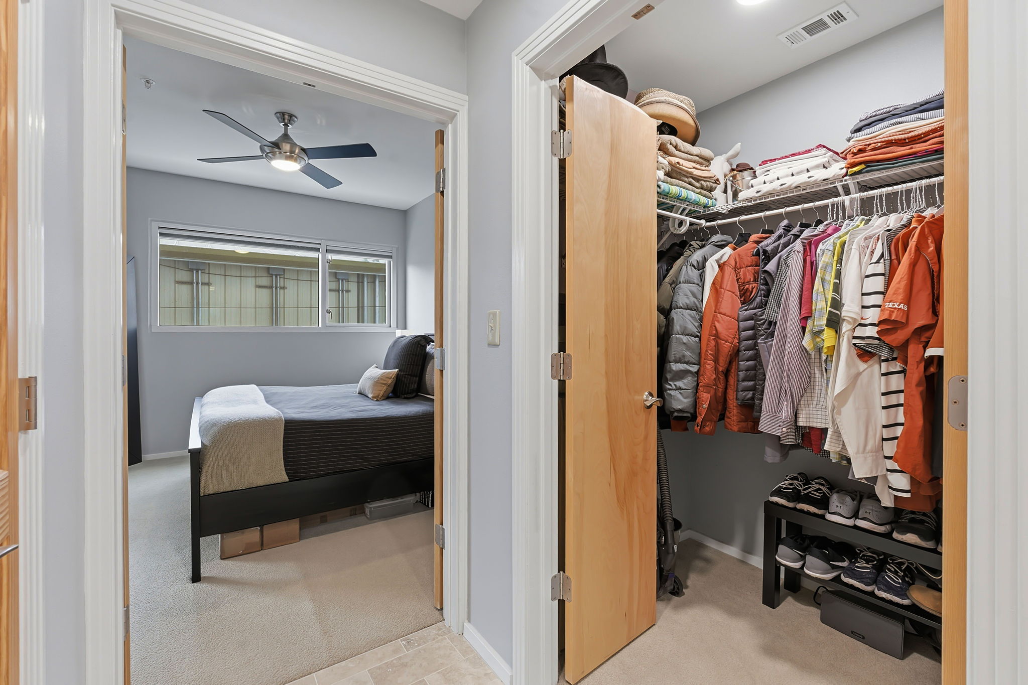 1600 Barton Springs Road, Unit 1106 Austin, TX 78704 - Photo 18 of 39 a view of walk in closet with clothes and shoes