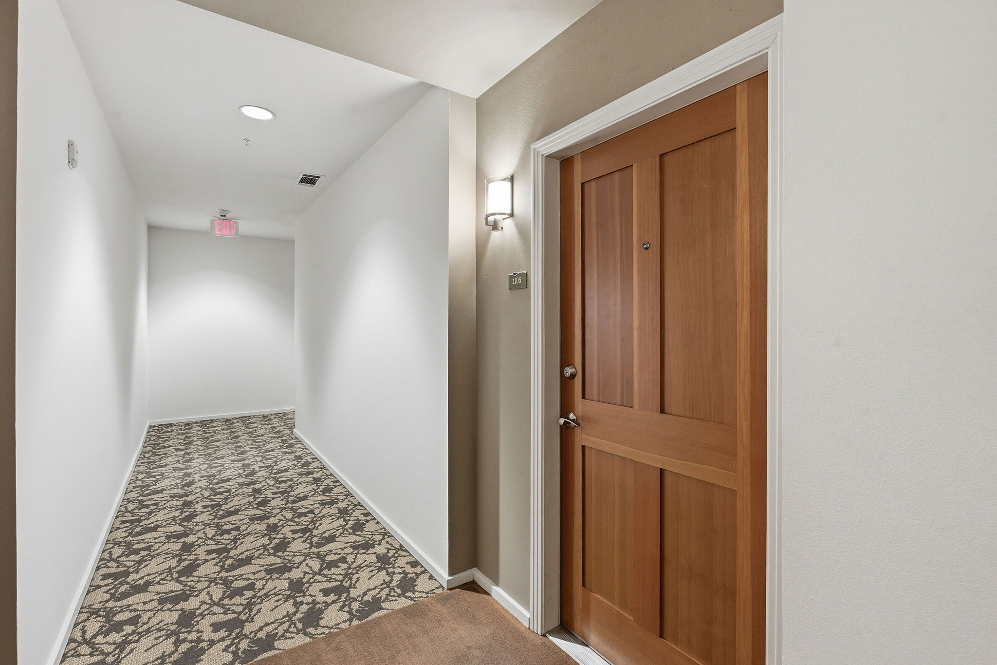 1600 Barton Springs Road, Unit 1106 Austin, TX 78704 - Photo 24 of 39 wooden floor with cabinet