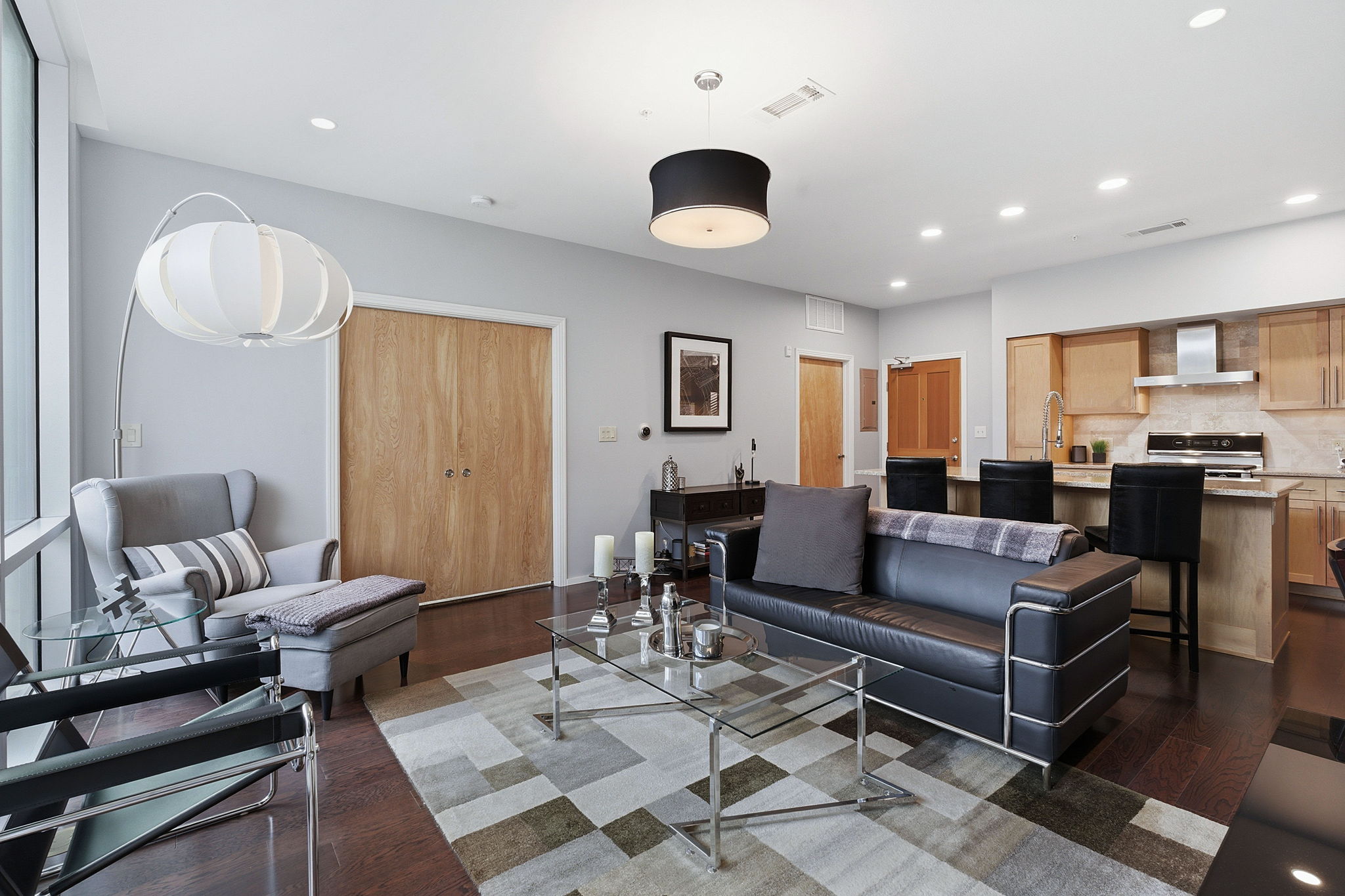 1600 Barton Springs Road, Unit 1106 Austin, TX 78704 - Photo 6 of 39 a living room with furniture and a large window