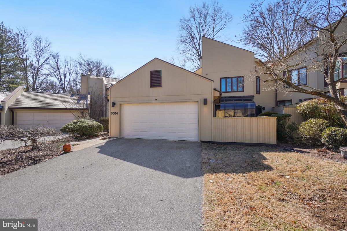 3004 Courtside Road Bowie, MD 20721 - Photo 2 of 45 a view of a house with a yard