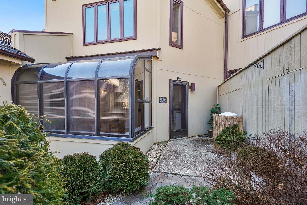 3004 Courtside Road Bowie, MD 20721 - Photo 41 of 45 a front view of a house with a garden