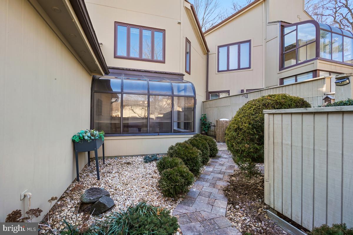 3004 Courtside Road Bowie, MD 20721 - Photo 42 of 45 a front view of a house with garden