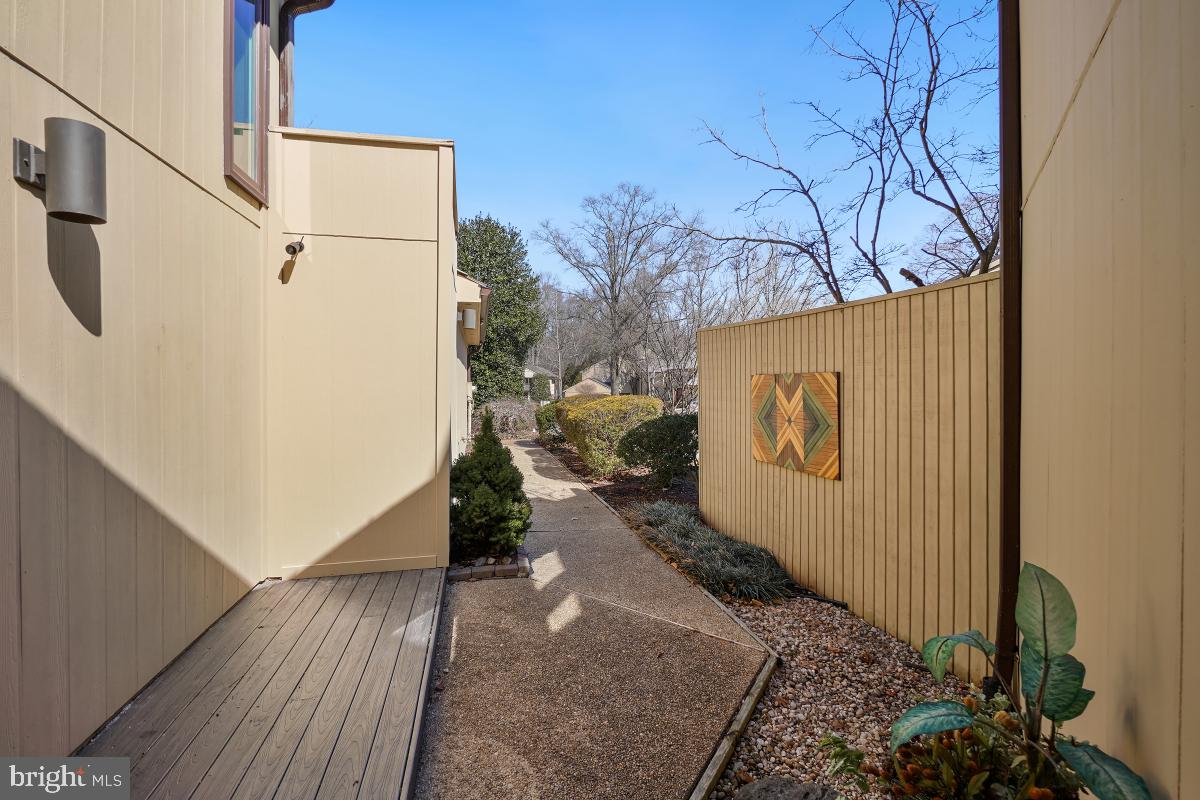 3004 Courtside Road Bowie, MD 20721 - Photo 5 of 45 a view of a pathway of a house with wooden fence