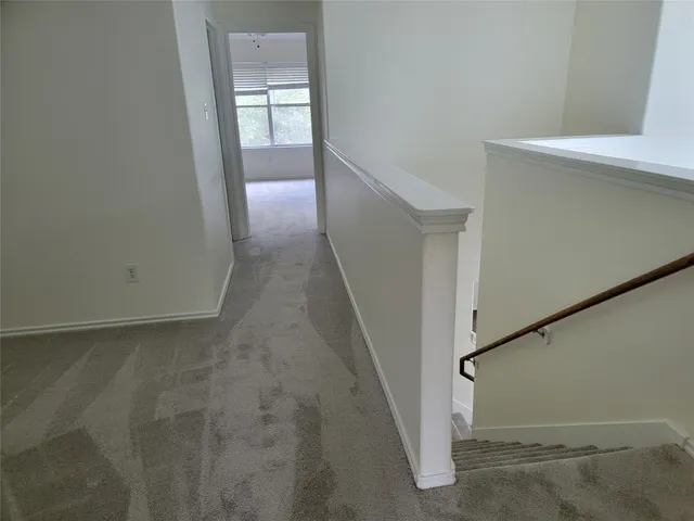 a view of hallway with stairs