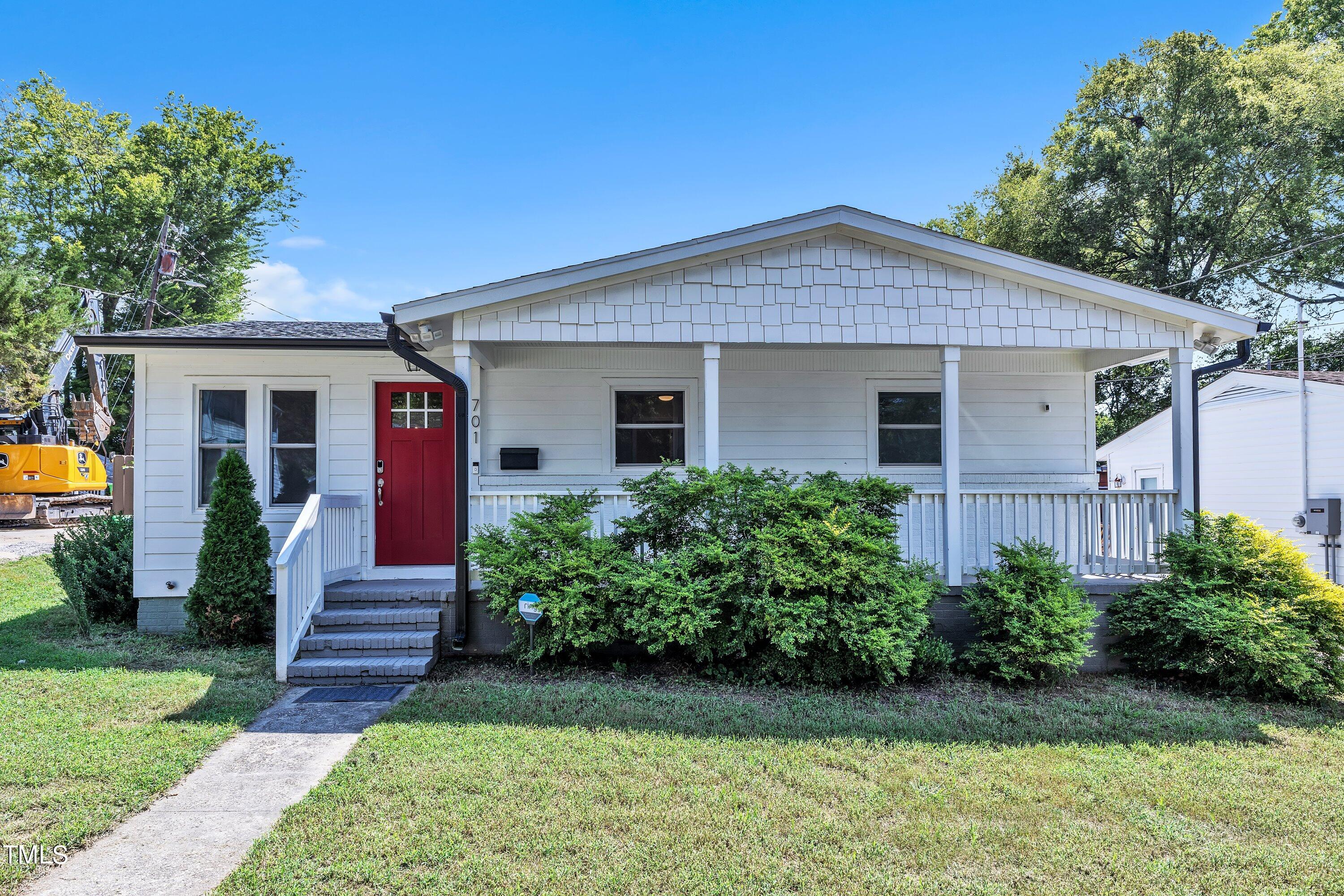 701 Coleman Street Raleigh, NC 27610 - Photo 1 of 38 a front view of house with yard and green space