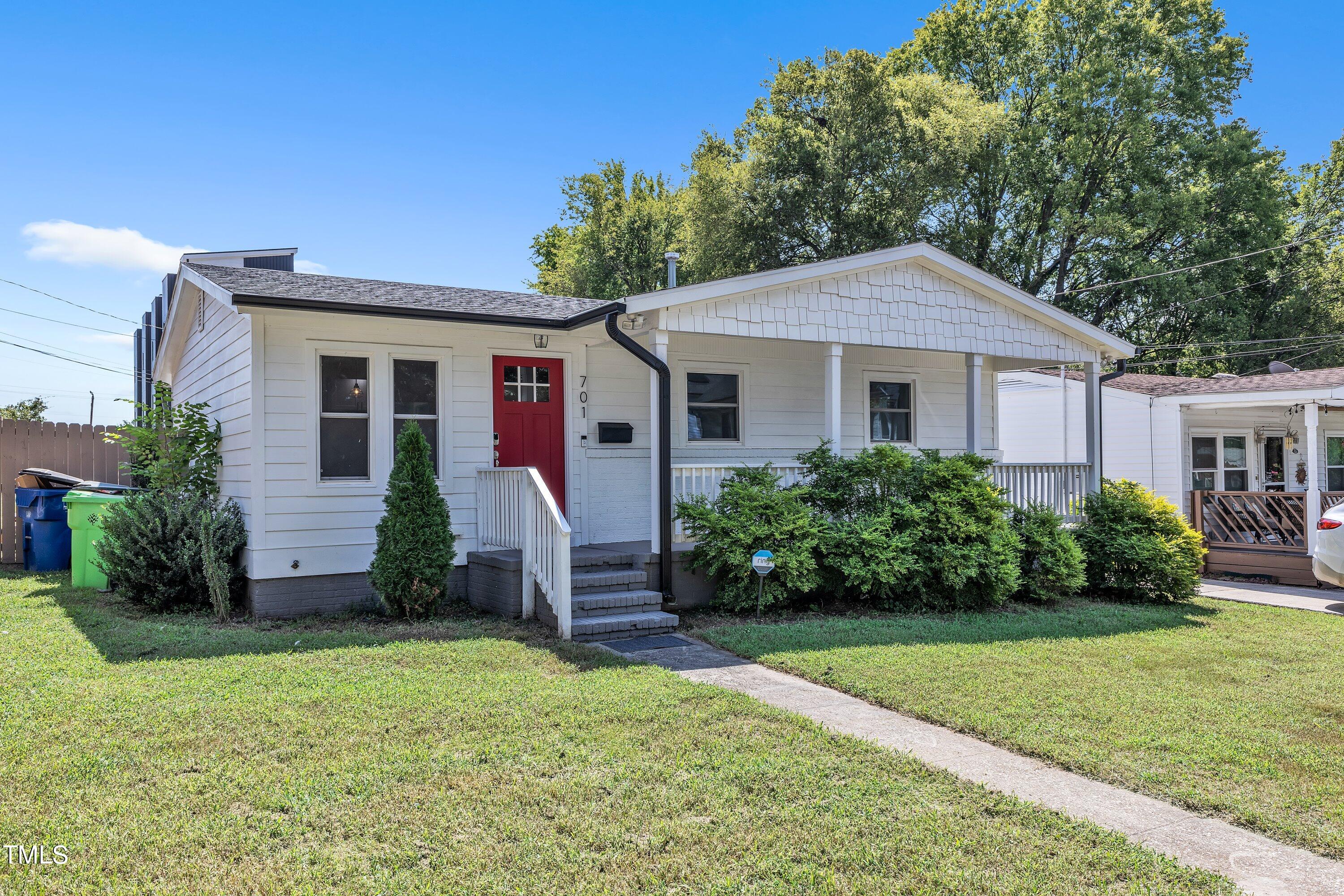 701 Coleman Street Raleigh, NC 27610 - Photo 2 of 38 a front view of house with yard and green space