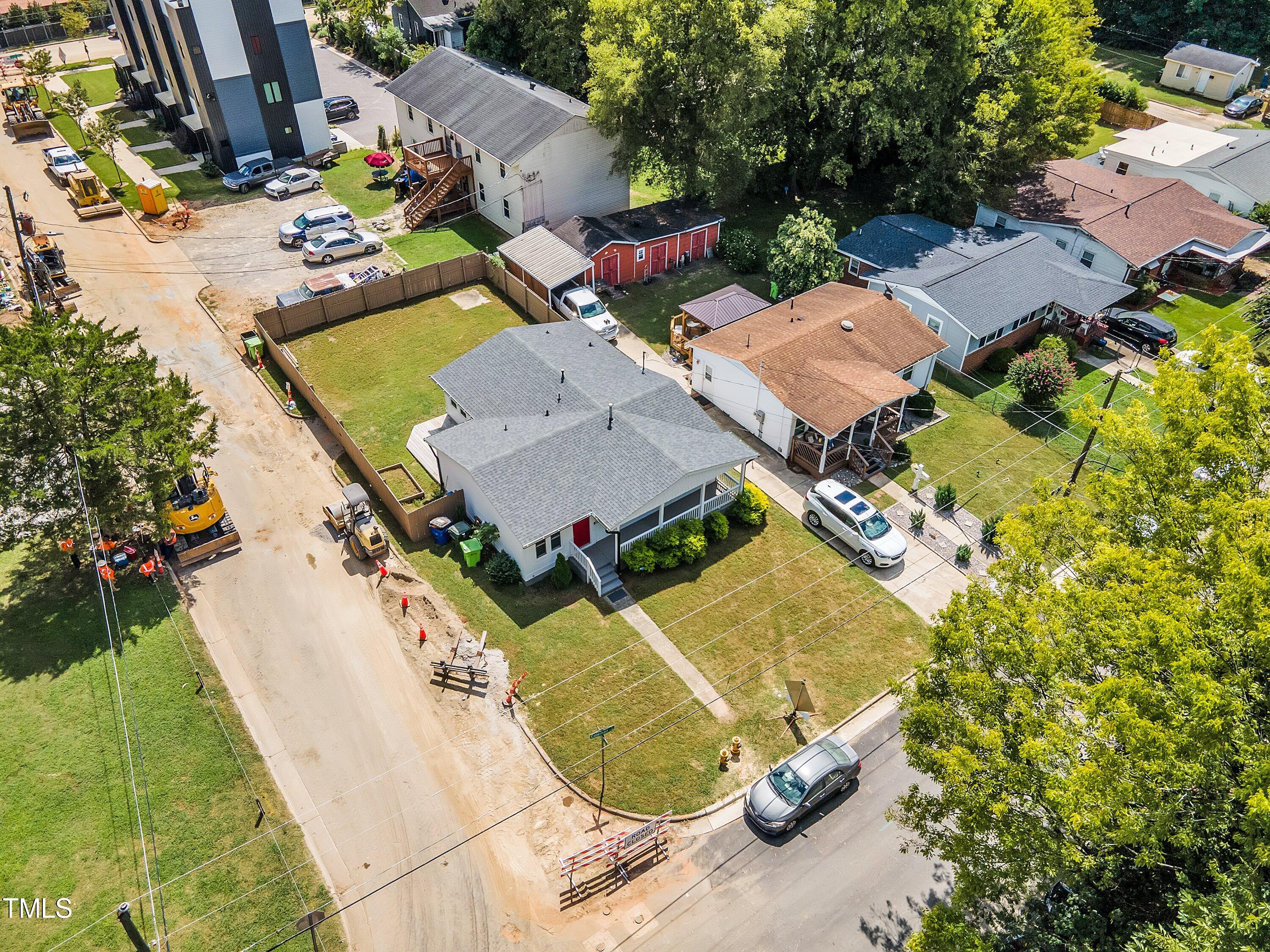 701 Coleman Street Raleigh, NC 27610 - Photo 36 of 38 an aerial view of a house with a yard and lake view