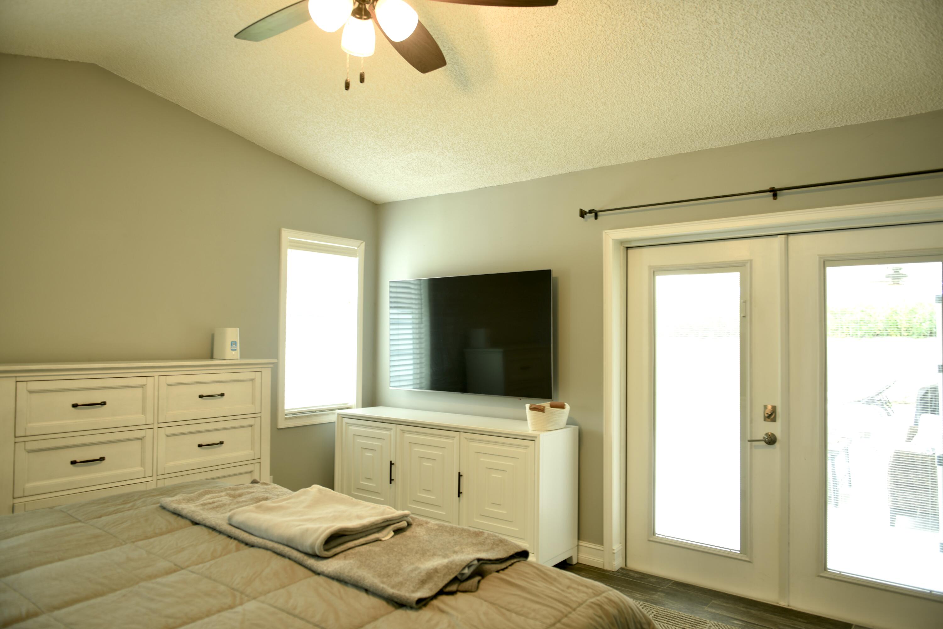14931 Southwest 168th Court Miami, FL 33187 - Photo 12 of 34 a bathroom with a sink a mirror and a bathtub
