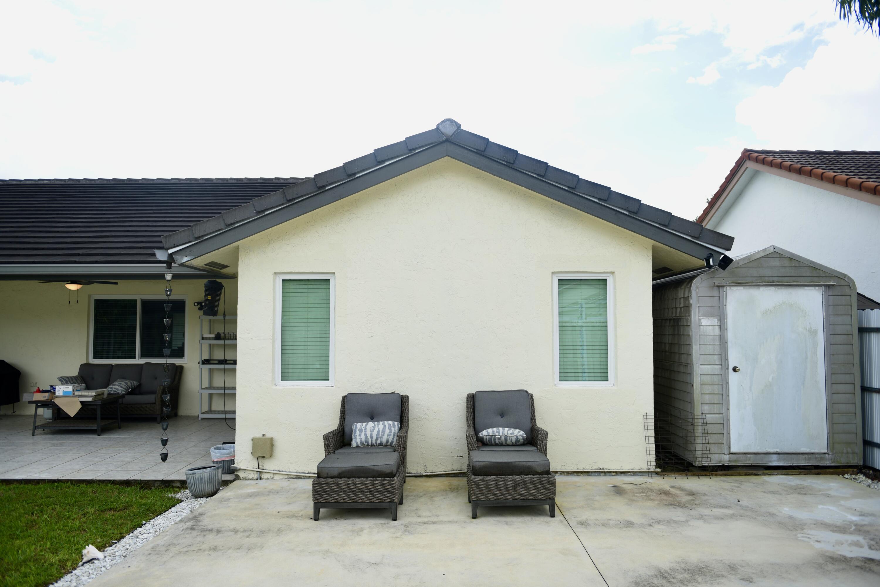 14931 Southwest 168th Court Miami, FL 33187 - Photo 22 of 34 a view of outdoor space yard and patio