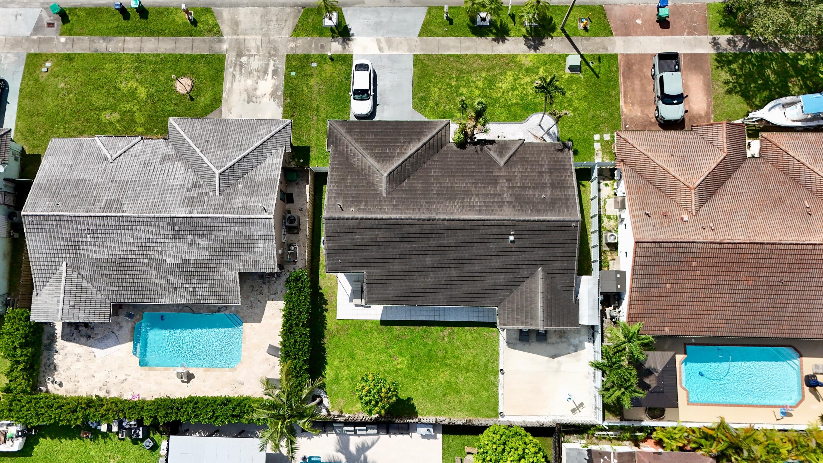14931 Southwest 168th Court Miami, FL 33187 - Photo 23 of 34 an aerial view of a house with a garden and plants