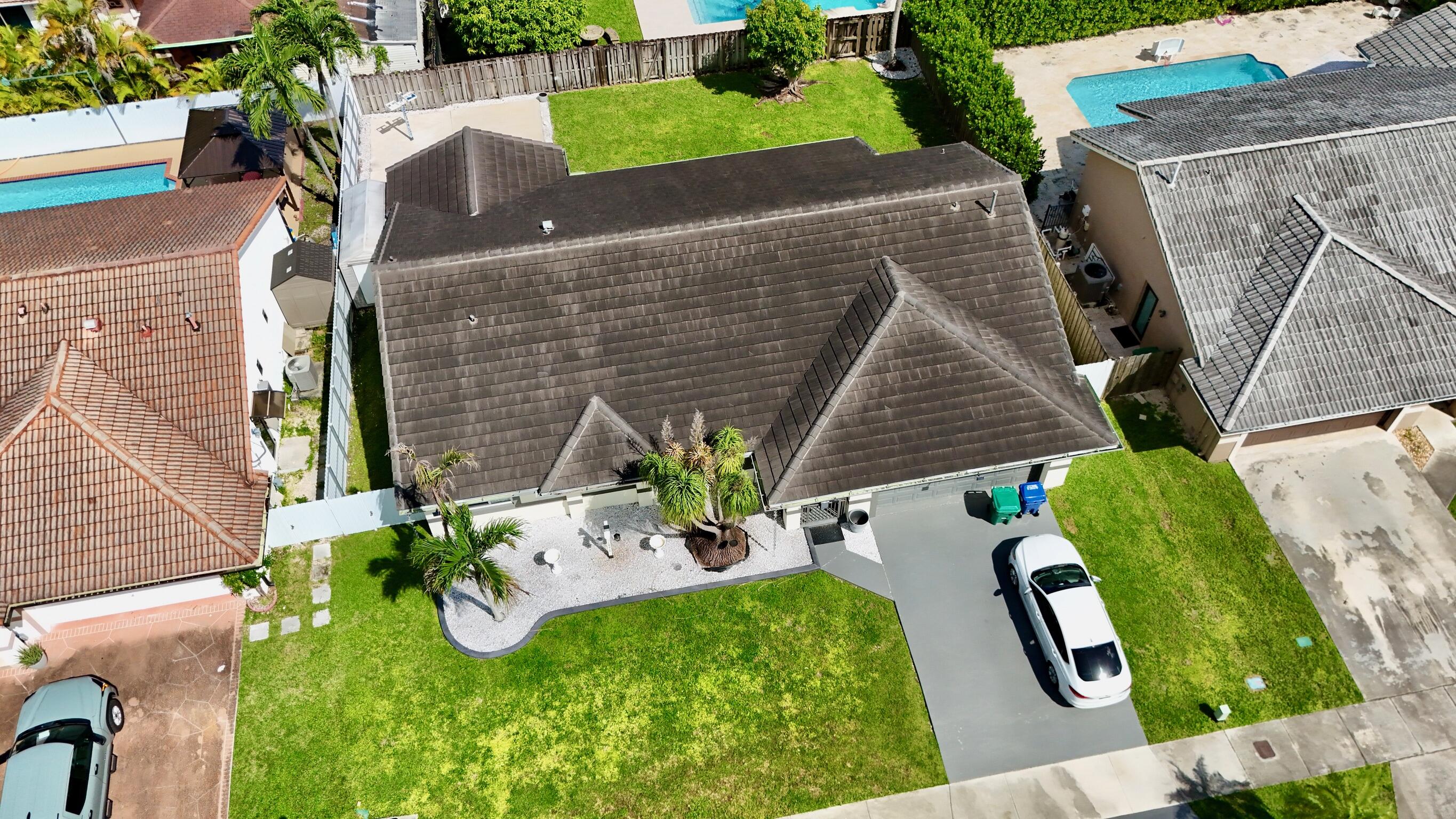14931 Southwest 168th Court Miami, FL 33187 - Photo 27 of 34 an aerial view of a house with garden