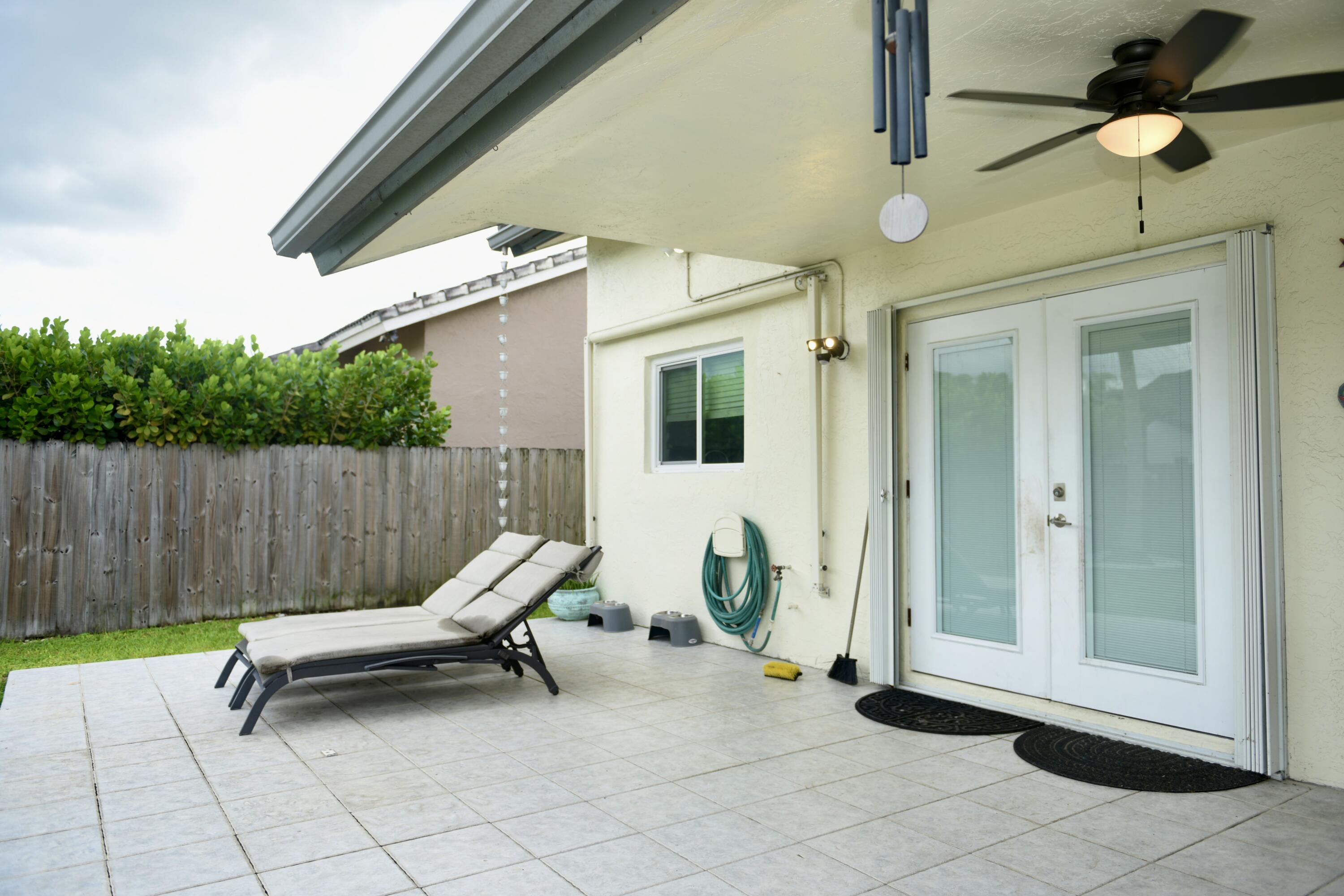 14931 Southwest 168th Court Miami, FL 33187 - Photo 32 of 34 a view of outdoor space with seating area