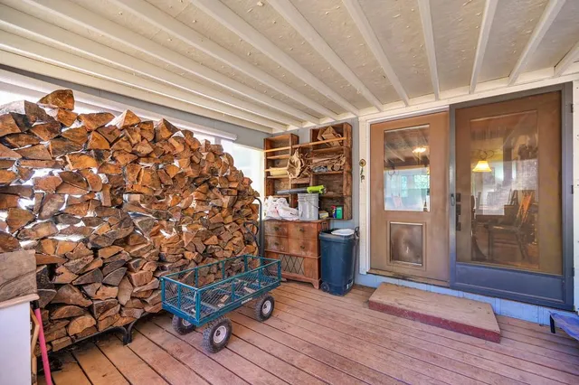 a view of a porch with furniture