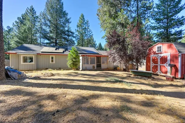 a view of a swimming pool with a patio