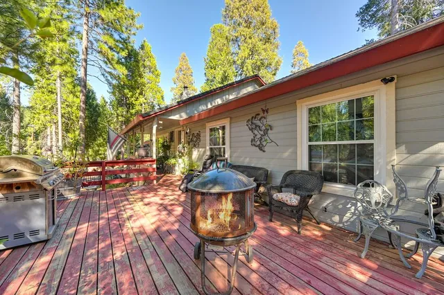 a view of a chairs and table on the wooden floor
