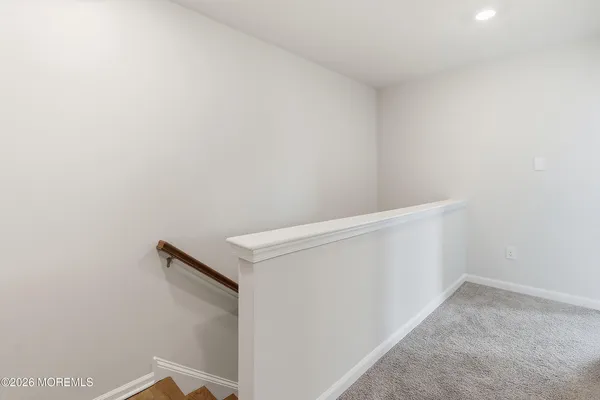 a view of a storage & utility room with washer and dryer