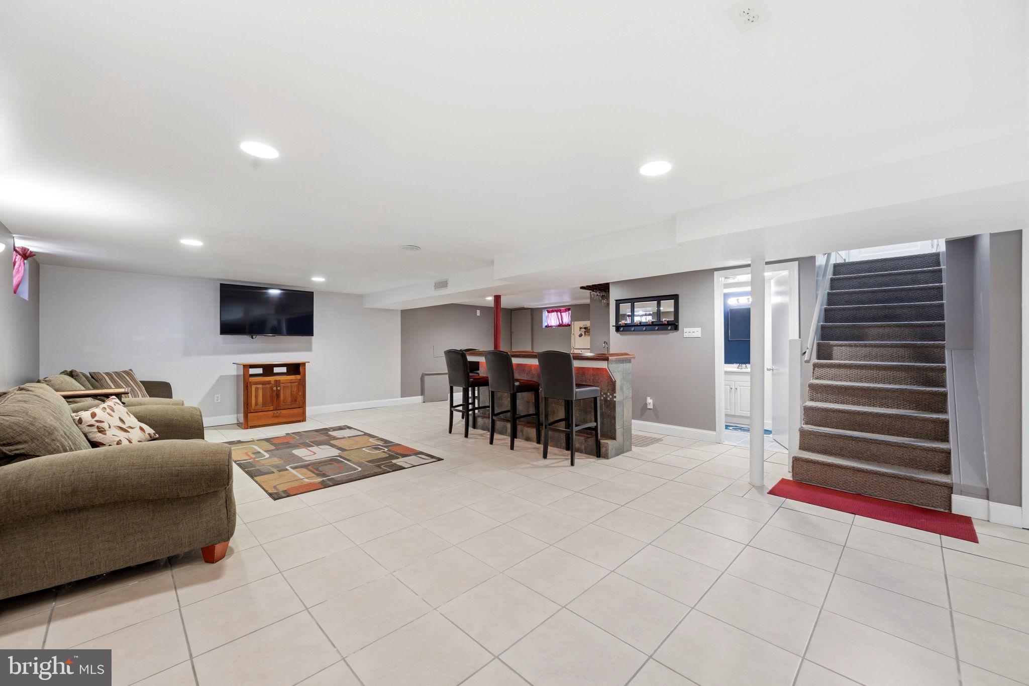 905 Amosland Road Morton, PA 19070 - Photo 34 of 44 Spacious, modern basement retreat.