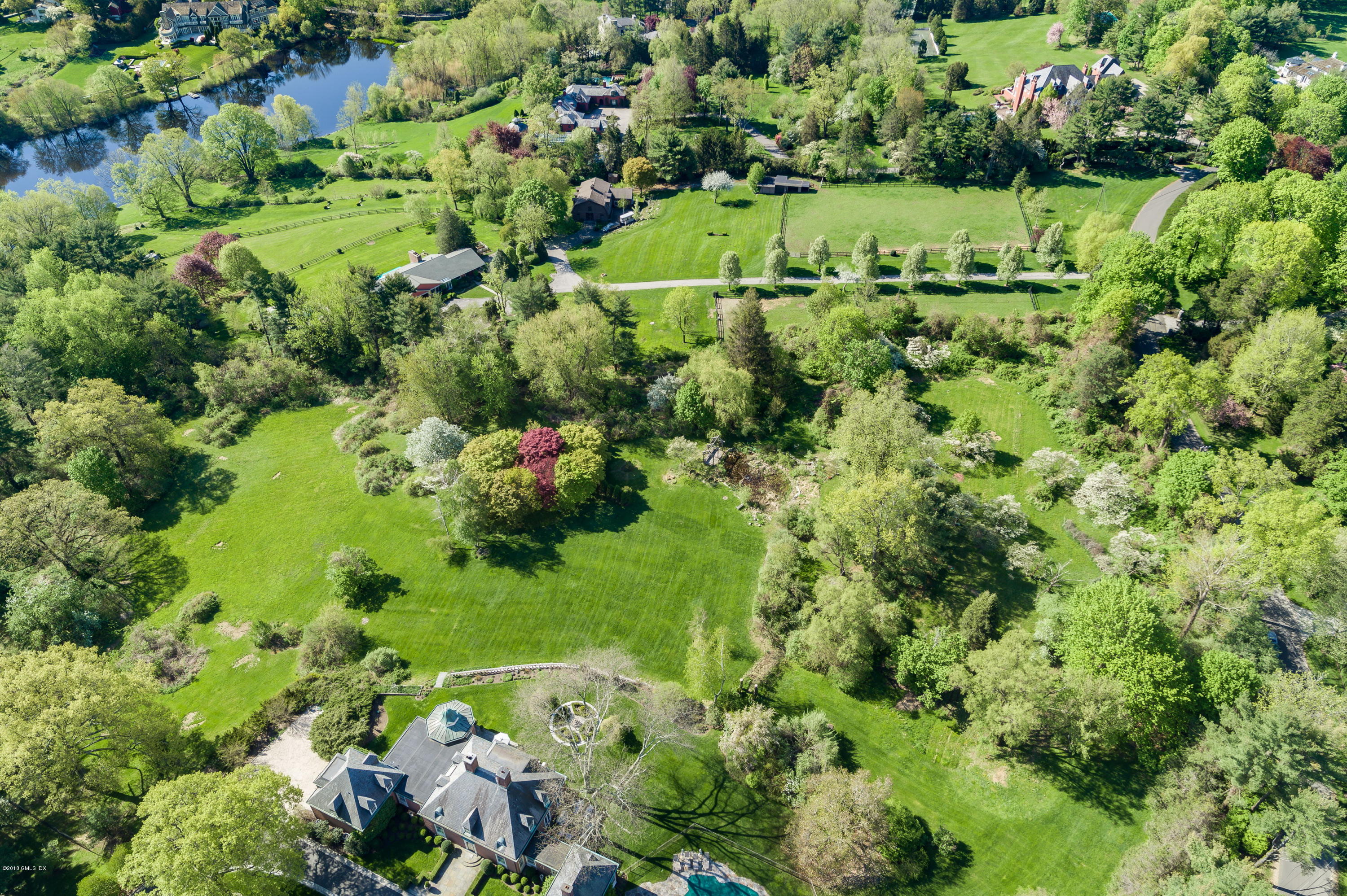 37 Aiken Road Greenwich, CT 06831 - Photo 2 of 16 37 Aiken Aerial with distant lake views