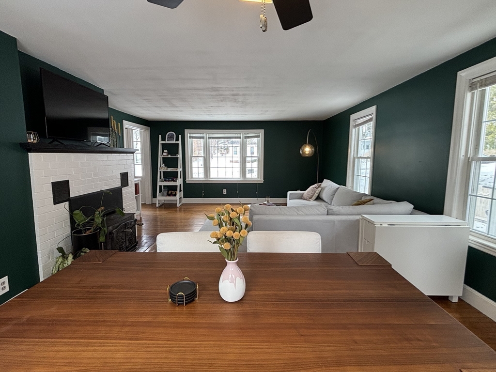 82 Prospect Street Gardner, MA 01440 - Photo 13 of 41 a view of a living room and kitchen with furniture