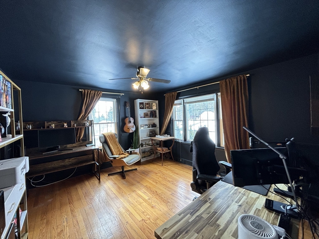 82 Prospect Street Gardner, MA 01440 - Photo 22 of 41 a living room with furniture gym equipment and a window