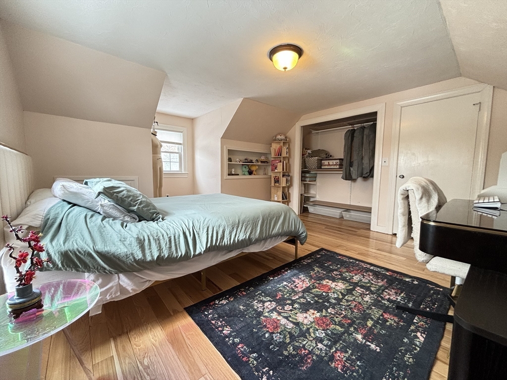 82 Prospect Street Gardner, MA 01440 - Photo 29 of 41 a bedroom with a bed and a view of living room