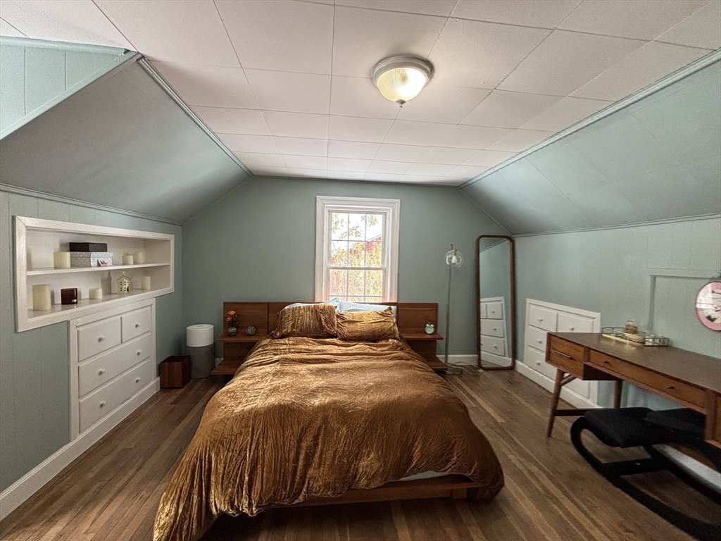 82 Prospect Street Gardner, MA 01440 - Photo 31 of 41 a bedroom with a bed and wooden floor