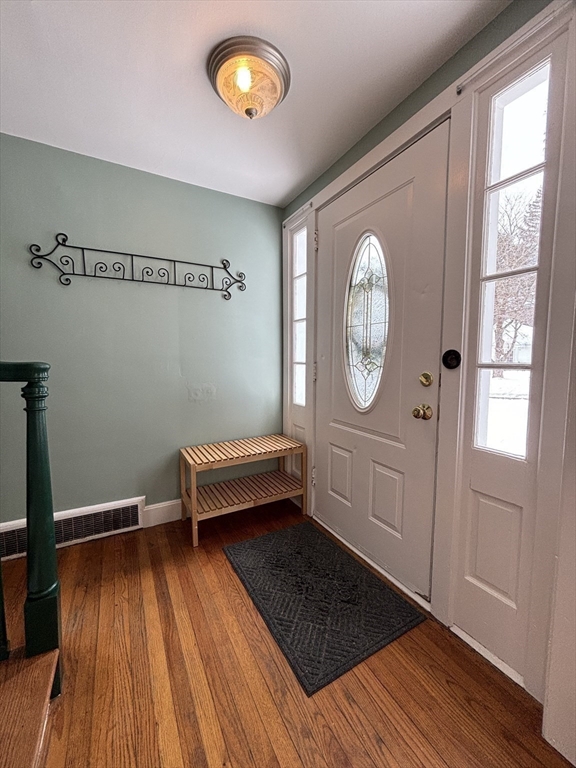 82 Prospect Street Gardner, MA 01440 - Photo 4 of 41 a room with wooden floors and glass windows