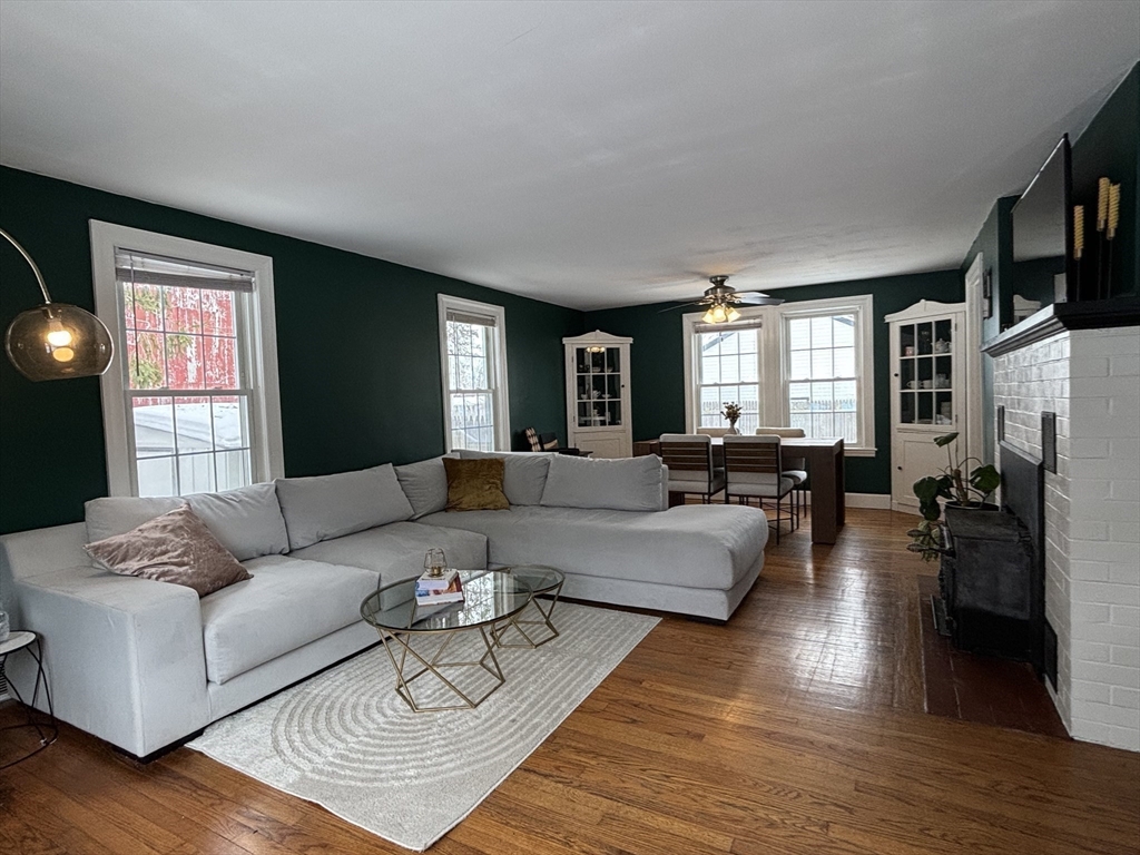 82 Prospect Street Gardner, MA 01440 - Photo 7 of 41 a living room with furniture or couch and a wooden floor
