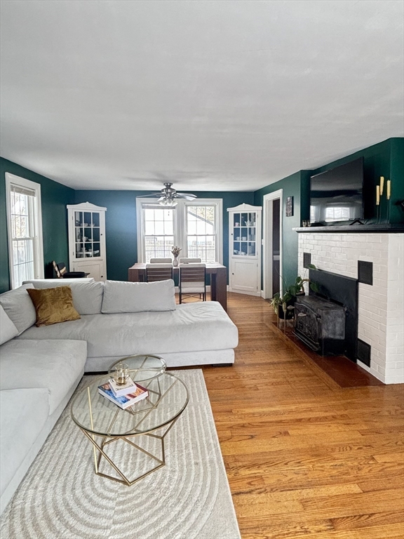 82 Prospect Street Gardner, MA 01440 - Photo 9 of 41 a living room with furniture and a fireplace