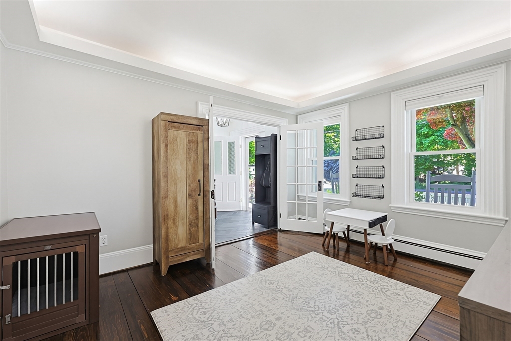 345 Sherman Street Canton, MA 02021 - Photo 15 of 42 a living room with furniture and windows