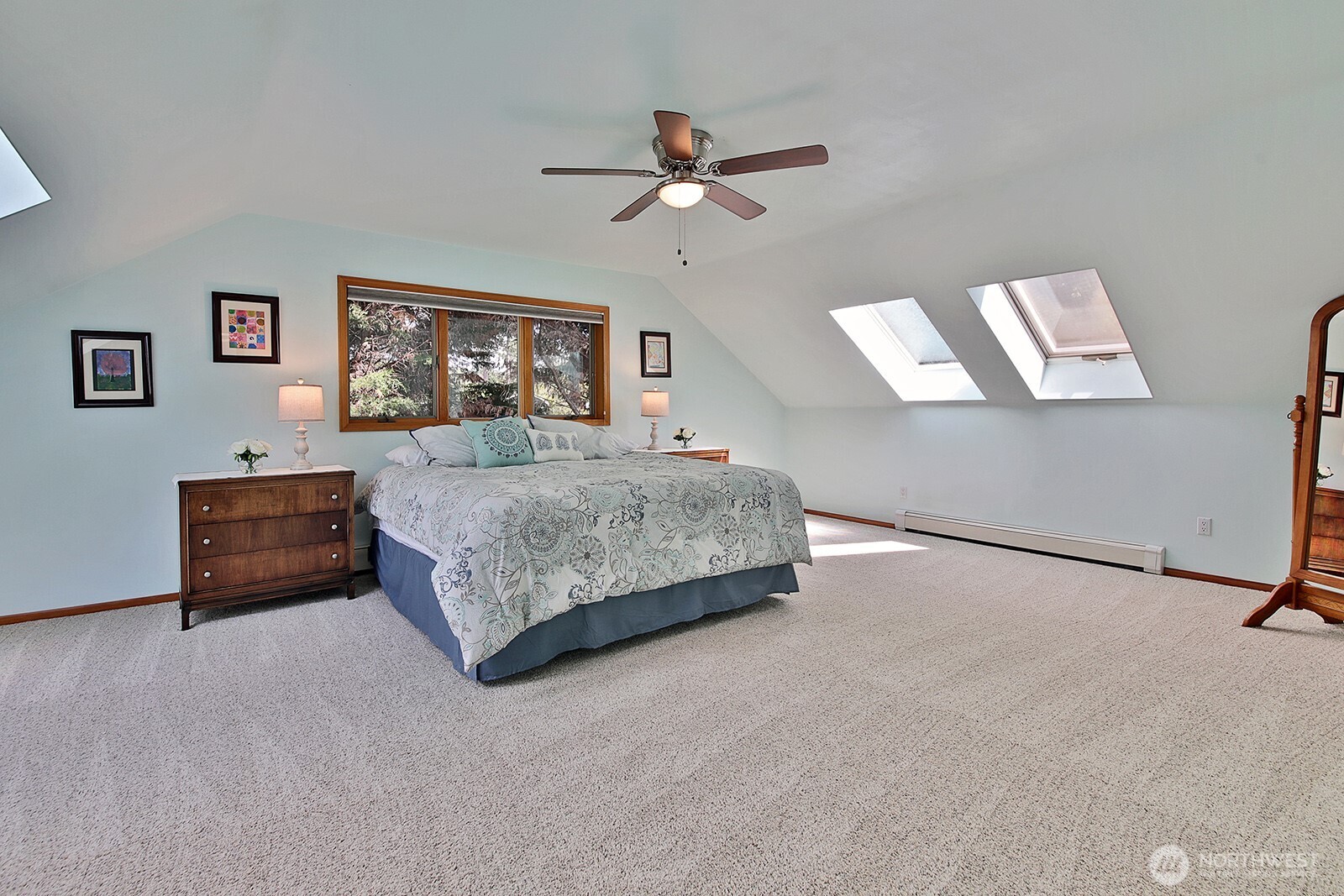 5741 Crow Haven Road Langley, WA 98260 - Photo 36 of 40 a bedroom with a bed dresser and a window